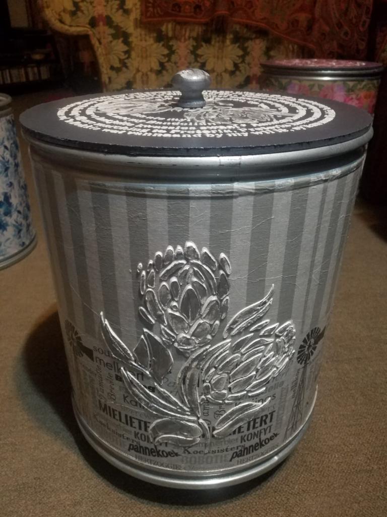 Grey Striped Bin with lid and stenciled Protea 